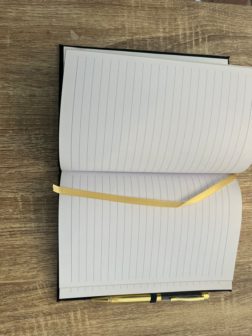 Notizbuch + Stift